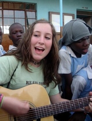 playin the guitar with african jpg